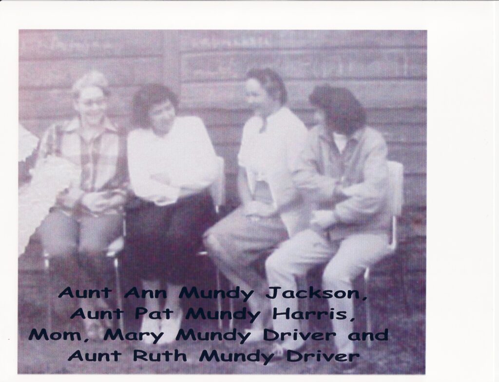 Ann, Pat, Mary and Ruth in back of 414 commercial