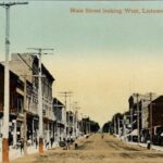 A colourized postcard photo of Main St.